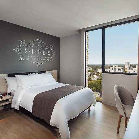 Hotel Sites Monteria Bagian luar foto